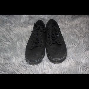 Plain black vans